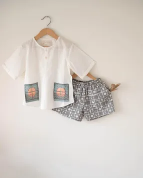 Sleepover Party’ unisex kids set with patch pocket kurta and shorts in grey moon chase hand block print